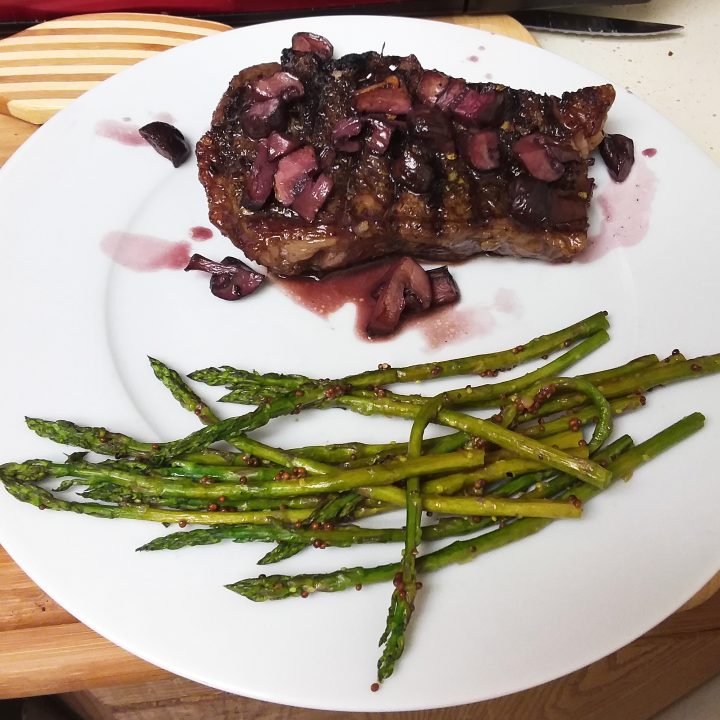 Strip Steak with Red Wine Mushroom Sauce and Mustard Roasted Asparagus