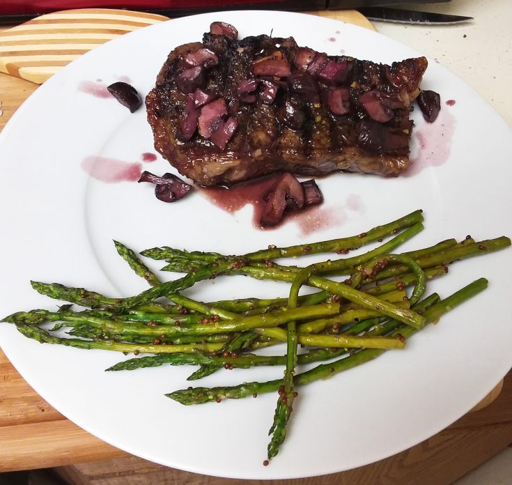 Strip Steak with Red Wine Mushroom Sauce and Mustard Roasted Asparagus
