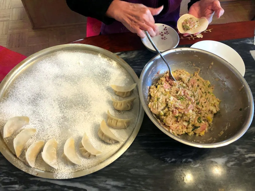 Learn how to make delicious Chinese Pork Dumplings, Potstickers, and the yummy dipping sauce that goes with it with this recipe!